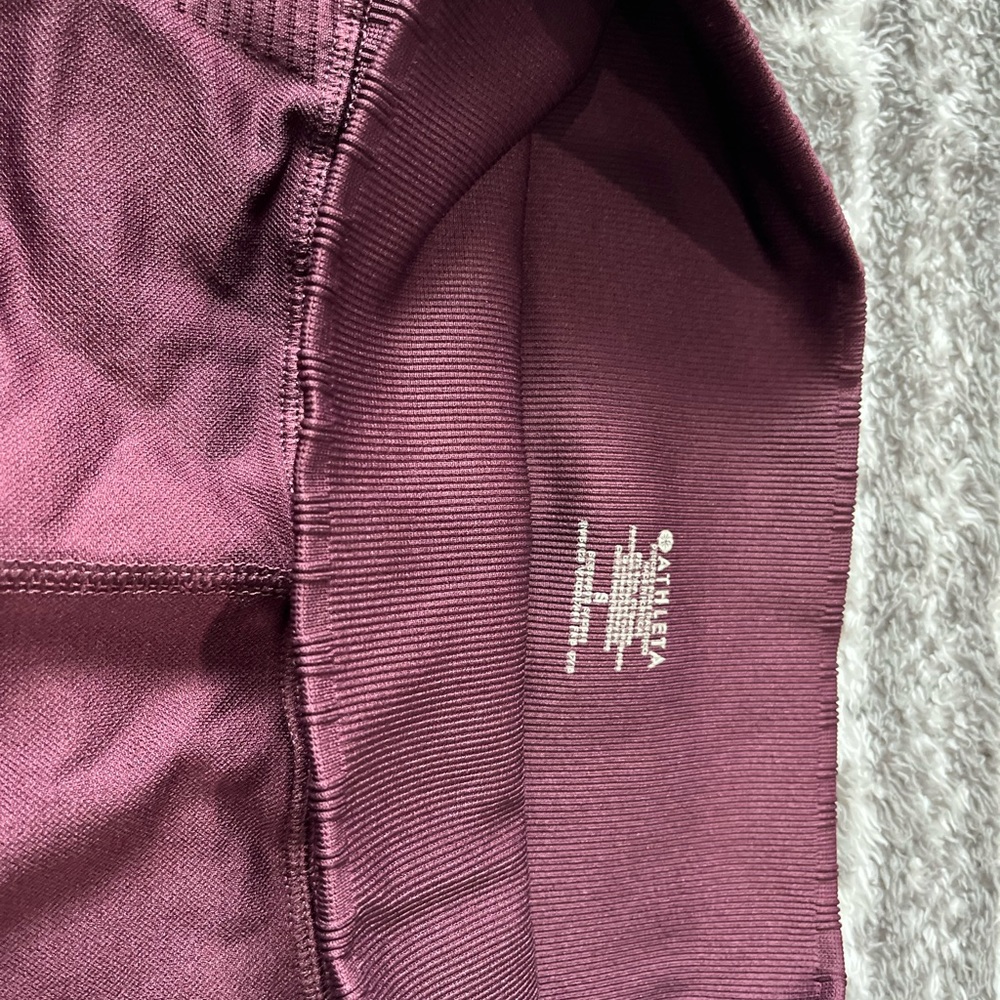 Athleta womens leggings in used condition Small. Dark Red wine color.